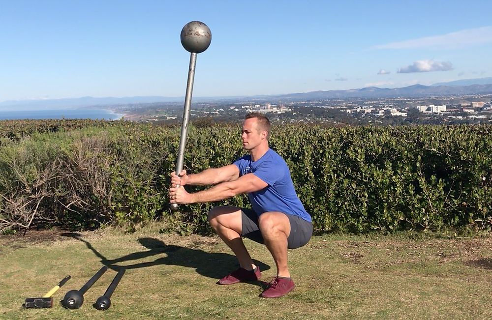 PHIL MCDOUGALL MACE FLAG SQUAT